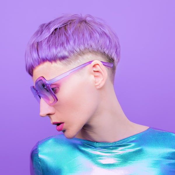 Futuristic Fashion Lady with Violet Short Hair. Trendy Hair Styl